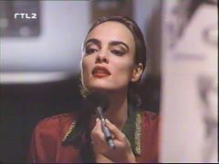Michelle Johnson(Danielle Wilde) becomes her alter-ego Chelsea in "Body Shot " (1993) 