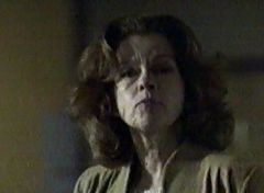 Genevieve Bujold taking off her lace front wig in "Eye of the Beholder" (1999).