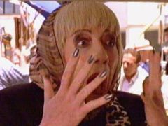 "Paws" movie, 1997. Anja (actress Sandy Gore) looses her wig.