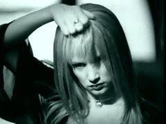 "Guess" jeans ad from 1996. Juliette Lewis, blond wig reveal.