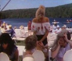 Video clip from movie "Dirty Dancing", many wigged women.