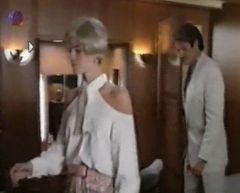 A Part from the series Baywatch.
They disguised as some sort of gangster to catch some other gangsters. White wig reveal.