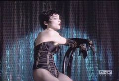 Wig reveal from Madonna's musical video clip Open your heart.